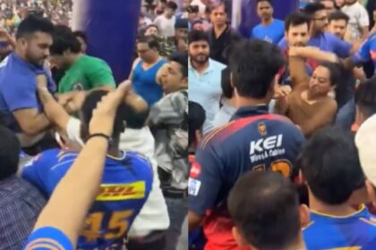 Delhi ిల్లీలో DC vs MI మ్యాచ్ సందర్భంగా ఐపిఎల్ అభిమానుల మధ్య అగ్లీ ఘర్షణ విరిగిపోతుంది. భద్రతా అధికారి జోక్యం చేసుకున్నారు